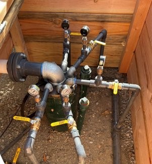 pipes and valves at a well